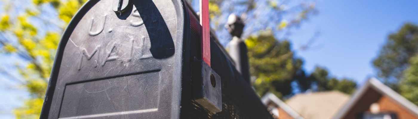 selective focus photography of a mailbox