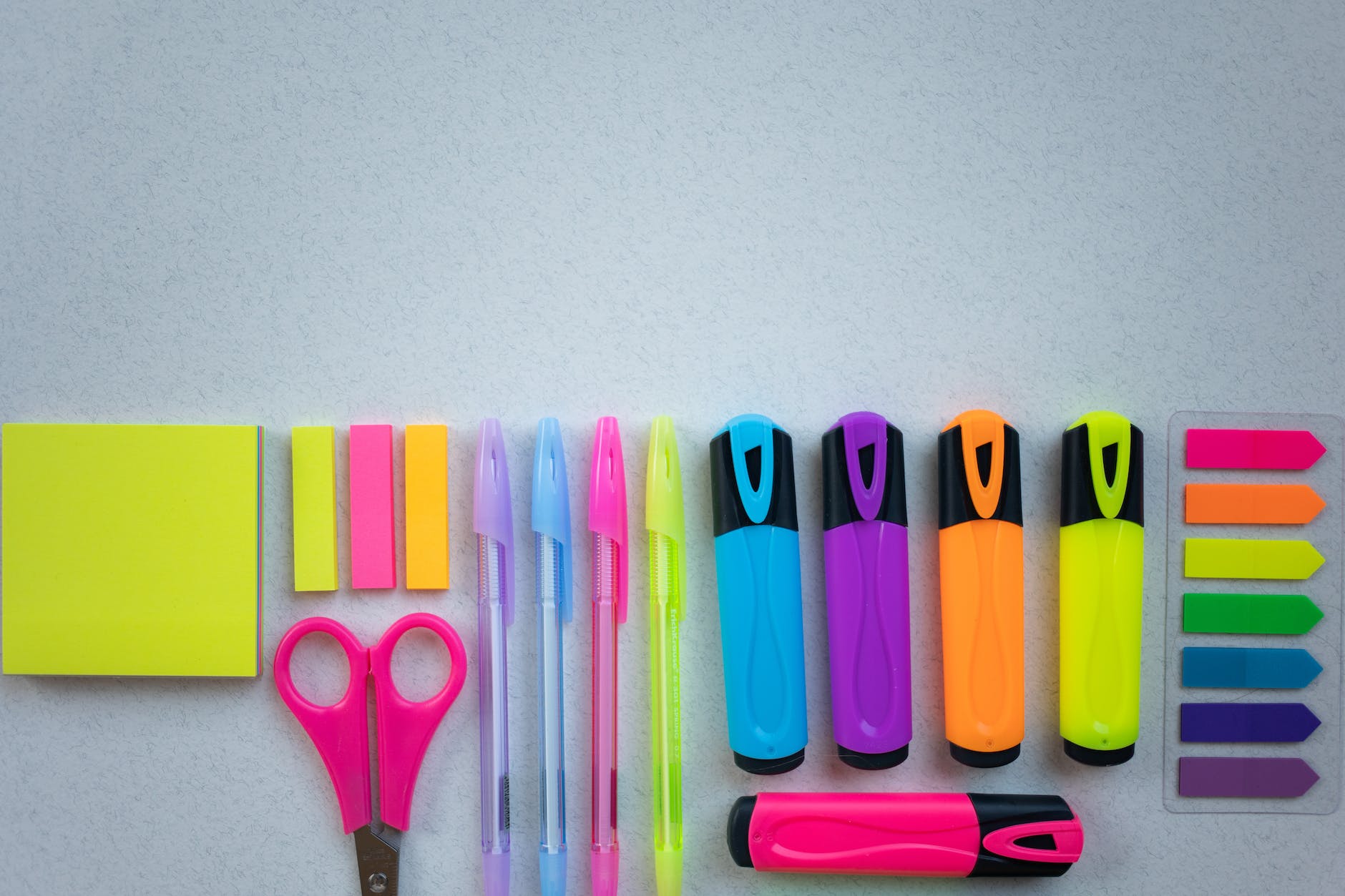school supplies on white surface