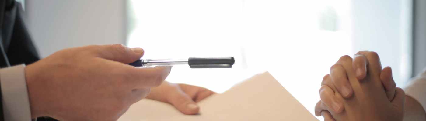 crop businessman giving contract to woman to sign